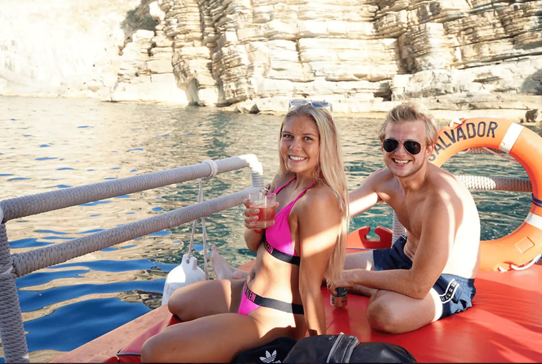 Two friends enjoying the sun at the bow
