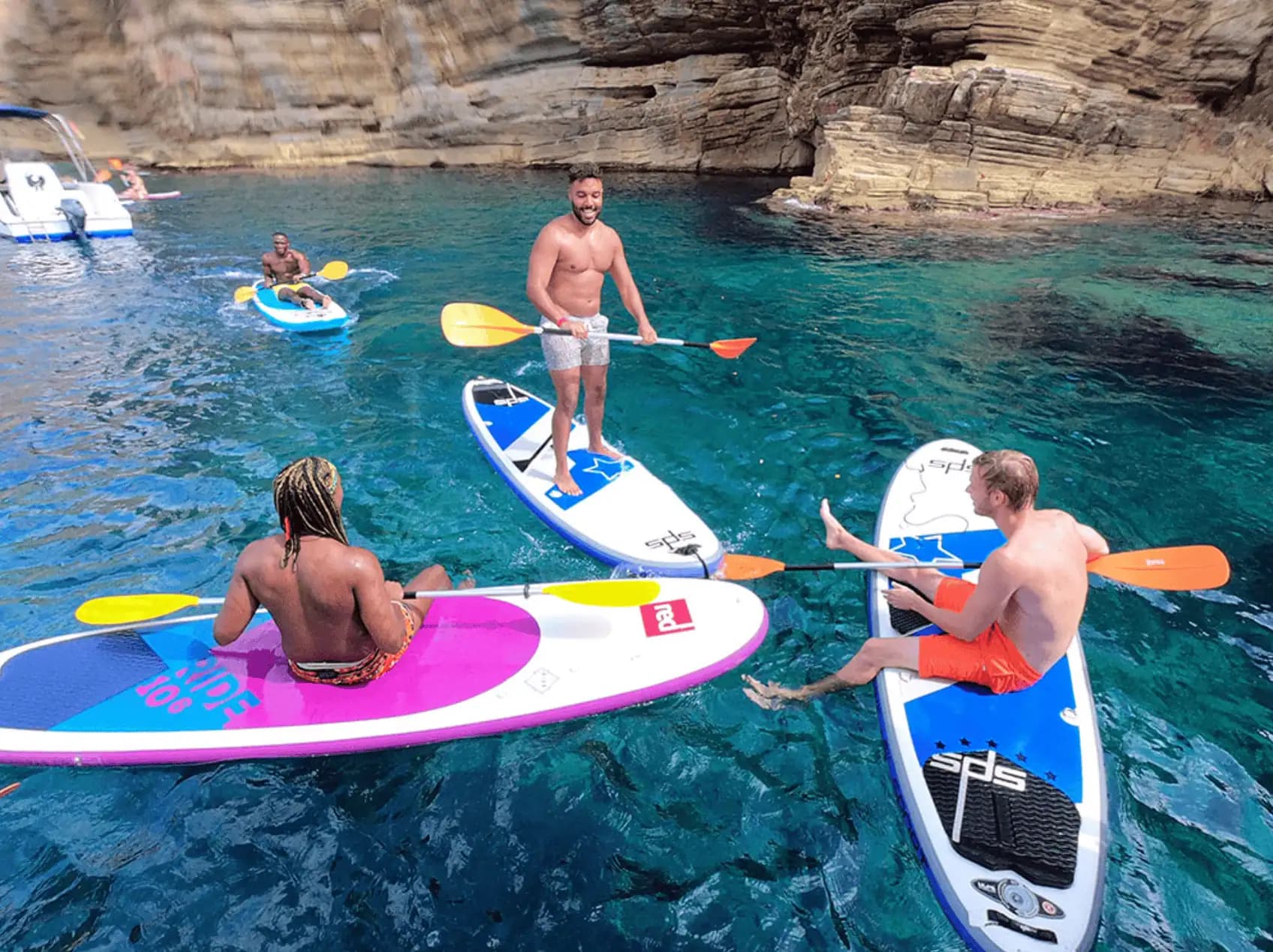 Group paddleboarding near the Ibiza coast